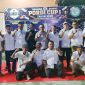 KETERANGAN FOTO: Ketua Pordi Pengda Kabupaten Karimun, Dr. Muhammad Firmansyah (tengah), foto bersama Panitia Turnamen Domino Pordi Cup I 2026 di Kedai Kopi Abu Dafi #11 | Foto: Pordi Karimun