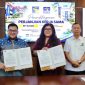 Foto : Ariastuty Sirait Anggota/Deputi Bidang Pelayanan Umum Bersama Dekan Fakultas Kedokteran UIB, dr.Wira Mondana